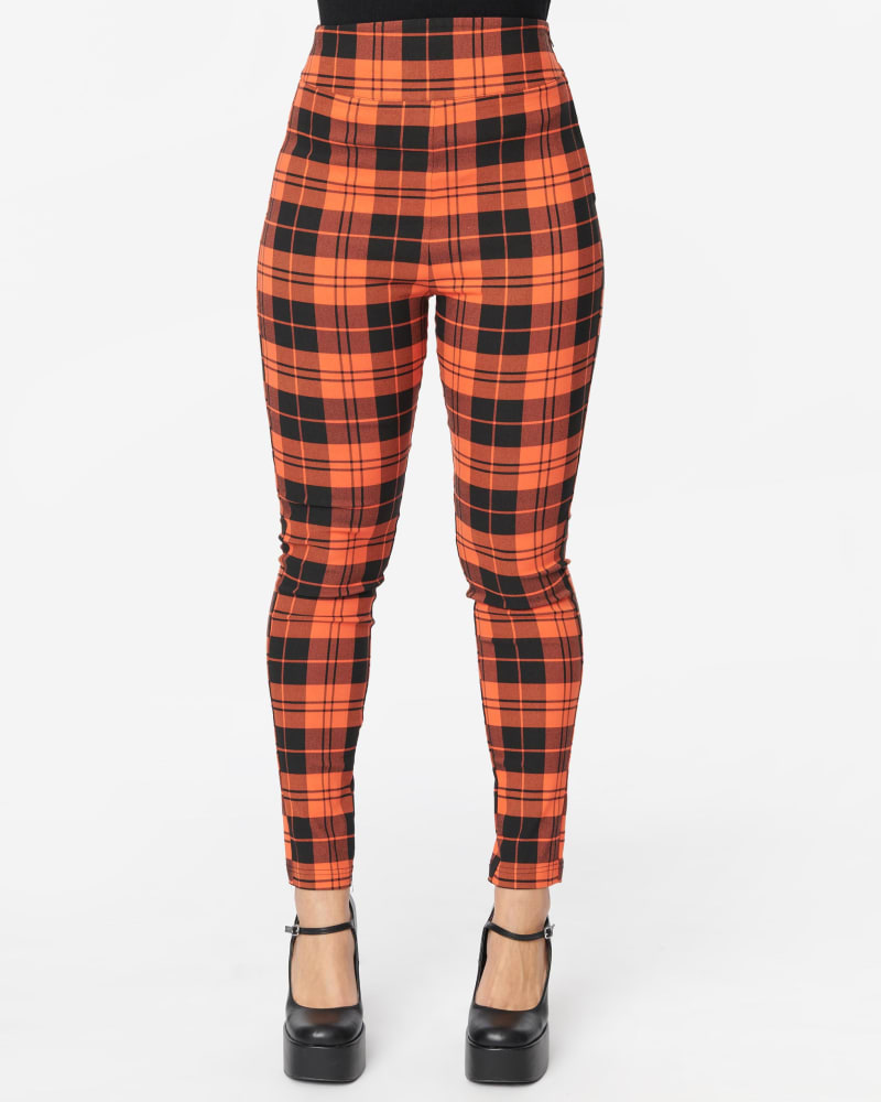 Front of a model wearing a size 2X Unique Vintage Orange Plaid Rizzo Cigarette Pants in Orange by Unique Vintage. | dia_product_style_image_id:302413